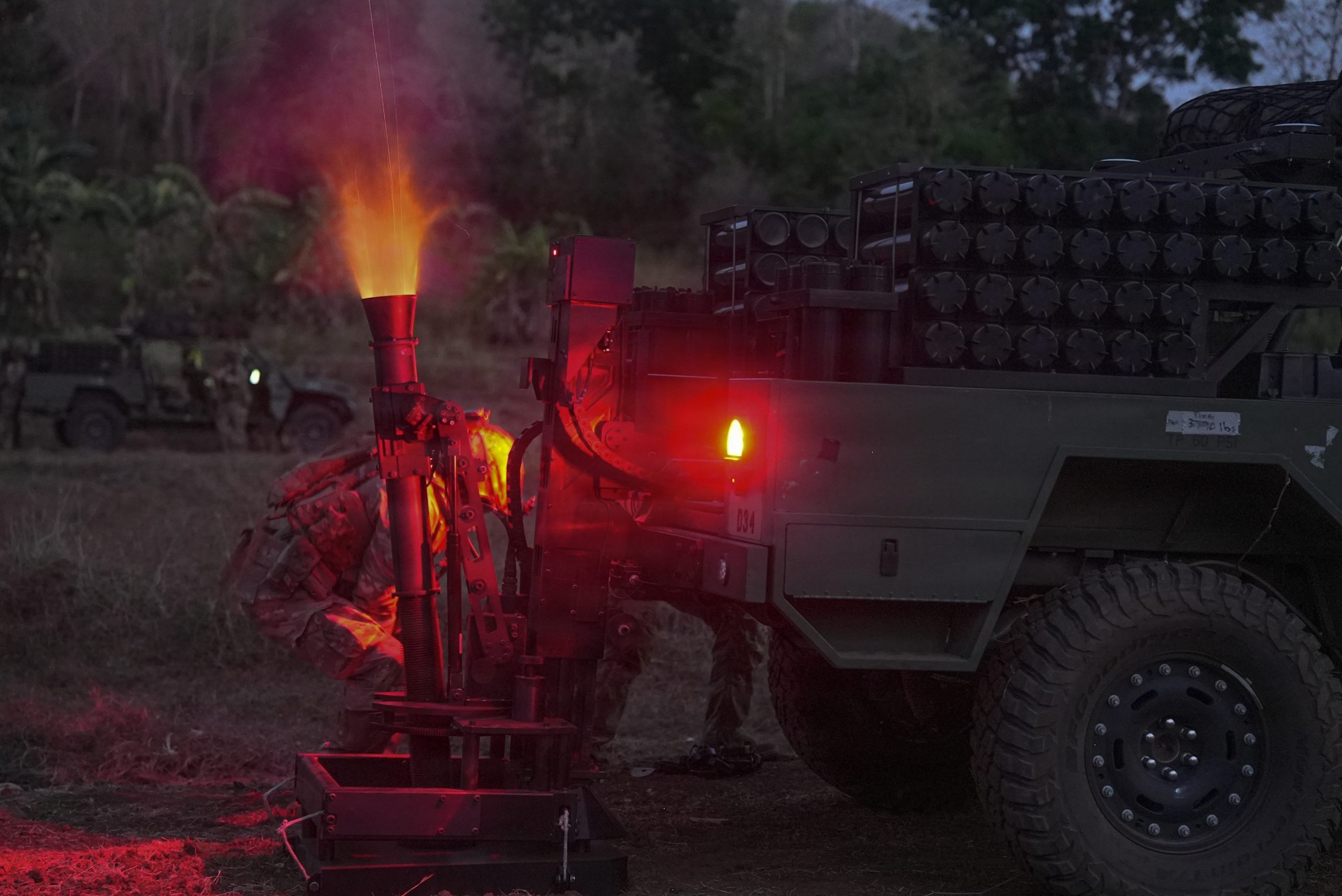 A U.S. Soldier assigned with 2nd Battalion, 35th Infantry Regiment, 3rd Mobile Brigade, 25th Infantry Division, fires the Scorpion Light 81mm mortar system during the night phase of a live-fire exercise, during Exercise Balikatan 2026 at Fort Magsaysay, Palayan City, Nueva Ecija, Philippines, April 24, 2026. Balikatan is a longstanding annual exercise between the Armed Forces of the Philippines and U.S. military that represents the strength of our alliance, improves our capable combined force, and demonstrates our commitment to regional peace and prosperity. (U.S. Army photo by Spc. Christopher Moorehead)